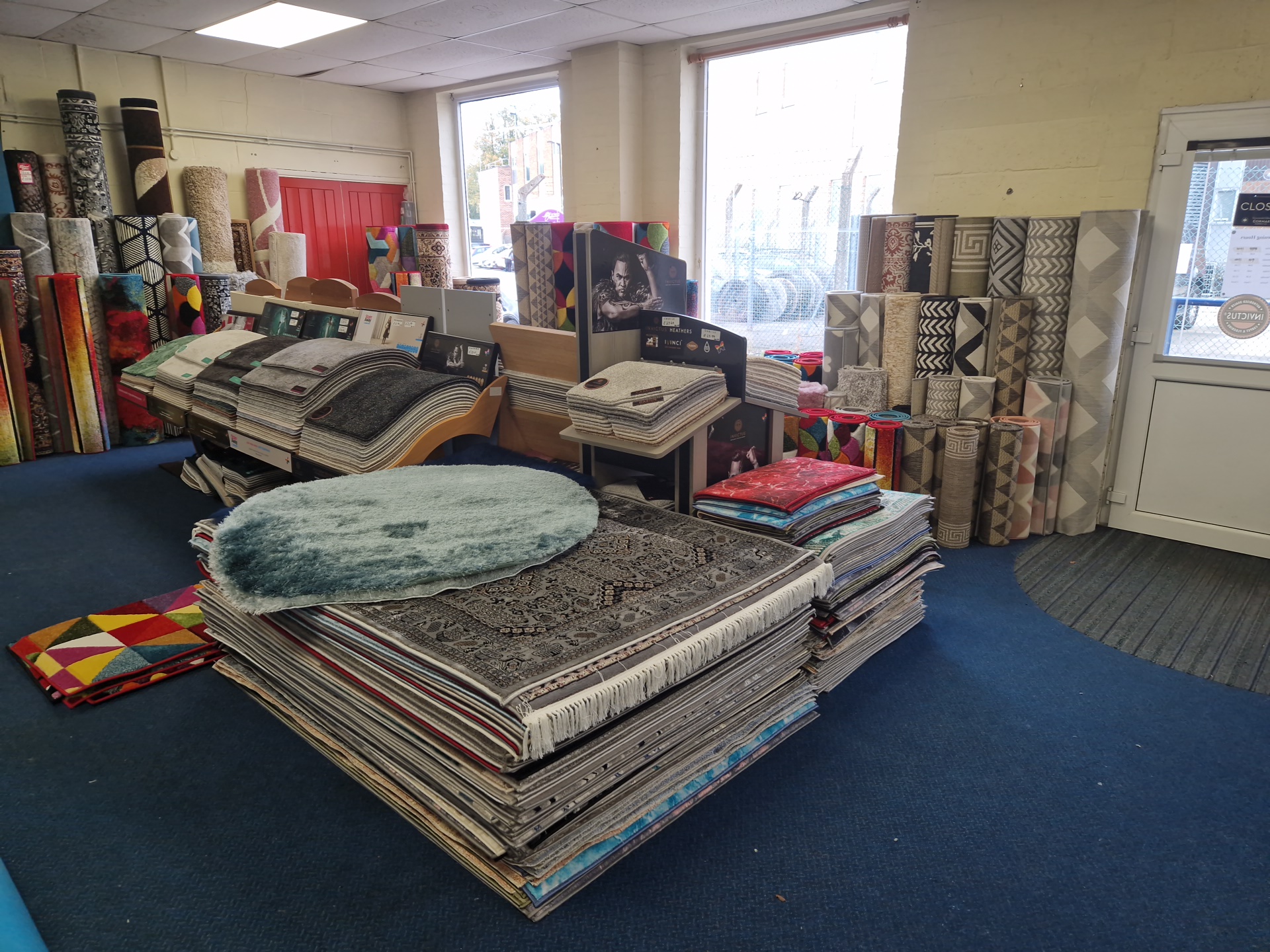 Inside the Wisbech Furnishings shop: rugs, carpet samples and rolls