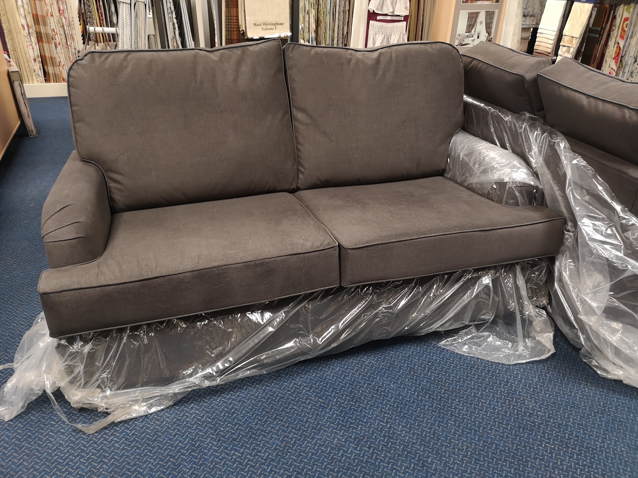 Grey two-seater sofa